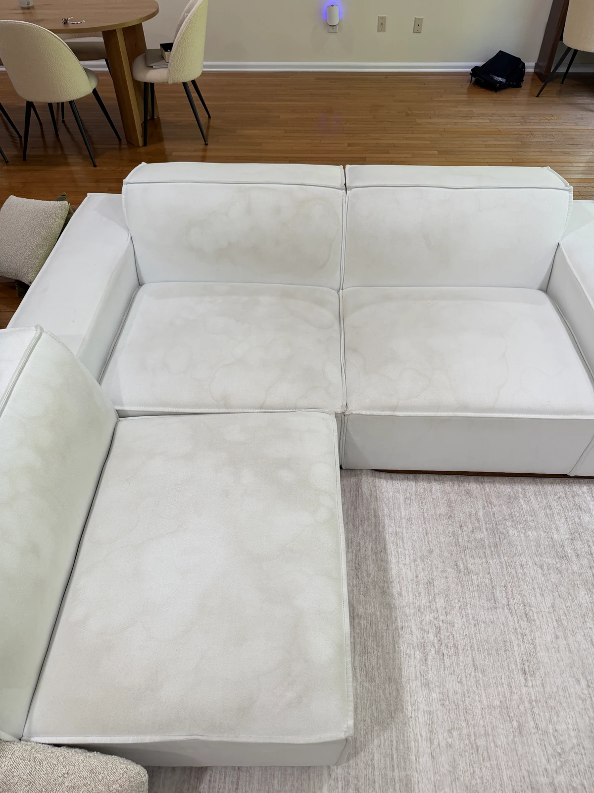 White sectional before cleaning