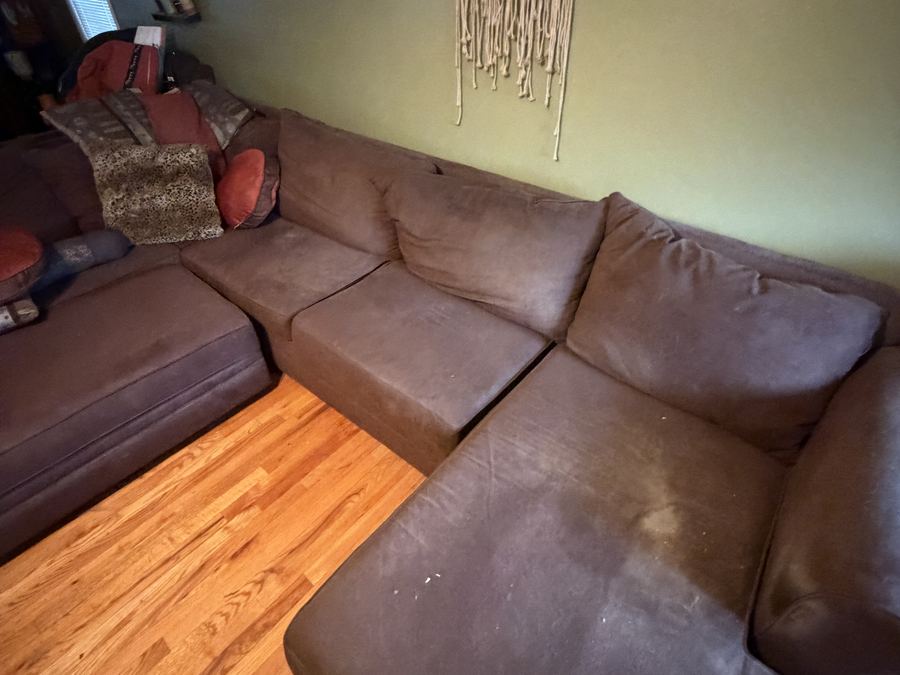 Dark brown sectional couch before deep cleaning in North NJ