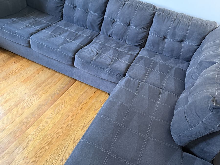 Same quilted sectional after professional extraction cleaning
